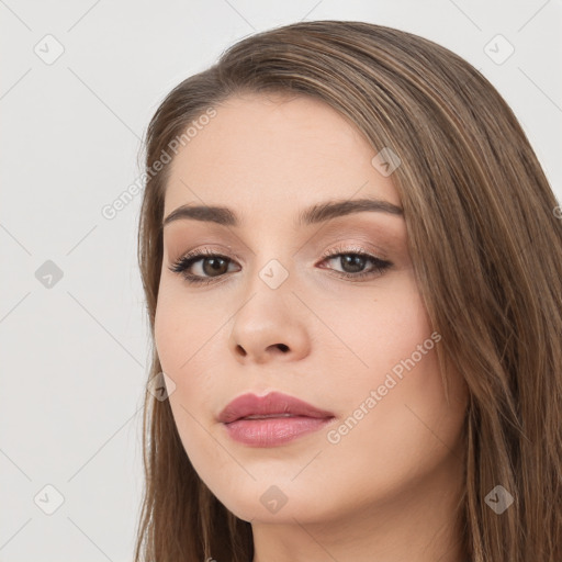 Neutral white young-adult female with long  brown hair and brown eyes