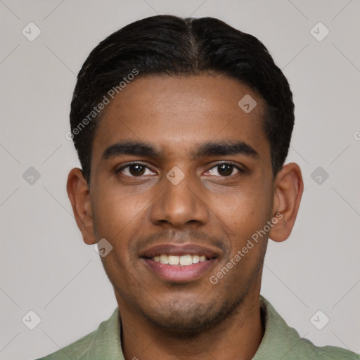 Joyful black young-adult male with short  black hair and brown eyes