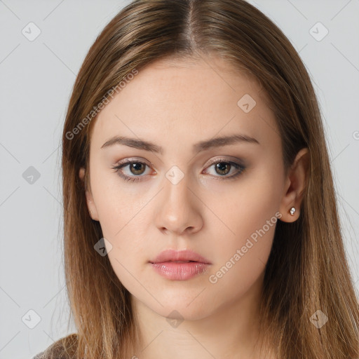 Neutral white young-adult female with long  brown hair and brown eyes