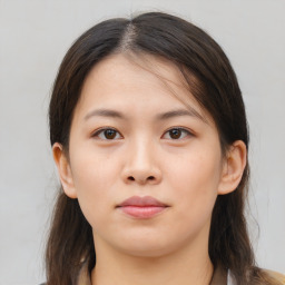 Neutral asian young-adult female with medium  brown hair and brown eyes