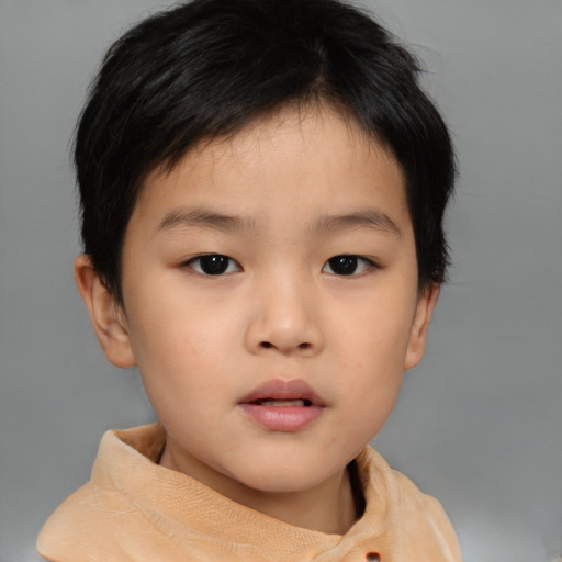 Neutral asian child male with short  brown hair and brown eyes