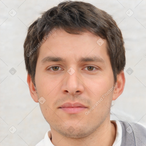 Neutral white young-adult male with short  brown hair and brown eyes