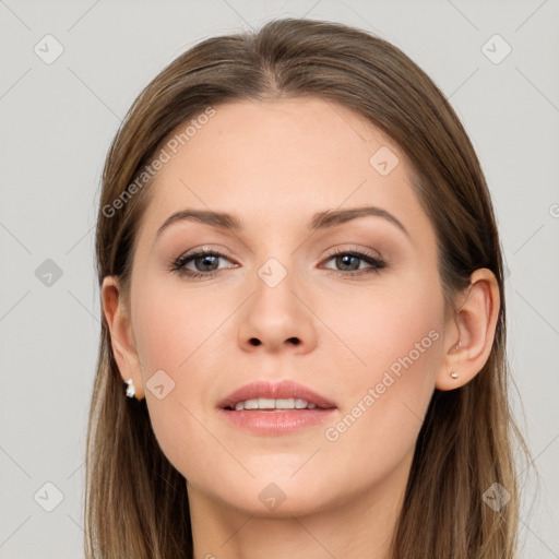 Joyful white young-adult female with long  brown hair and grey eyes