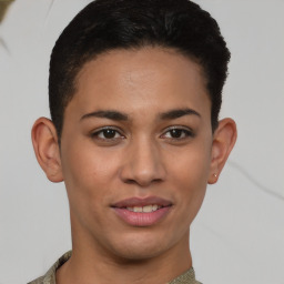 Joyful latino young-adult female with short  brown hair and brown eyes