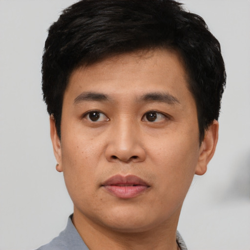 Neutral asian young-adult male with short  black hair and brown eyes