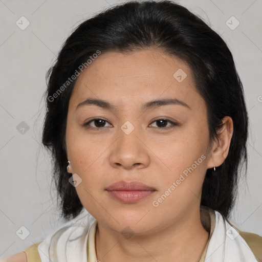 Joyful latino young-adult female with medium  brown hair and brown eyes