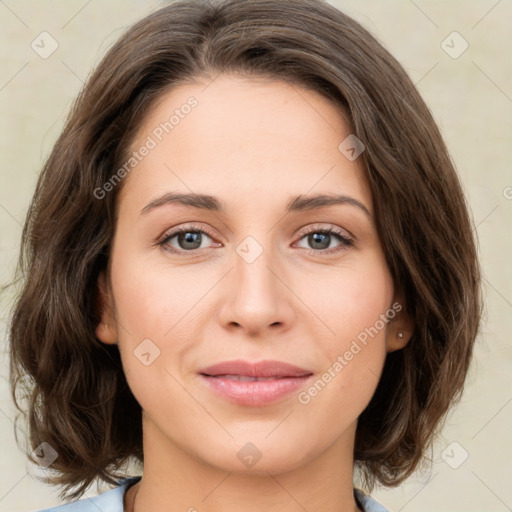 Joyful white young-adult female with medium  brown hair and green eyes