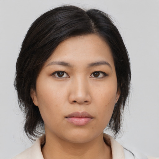 Neutral asian young-adult female with medium  black hair and brown eyes