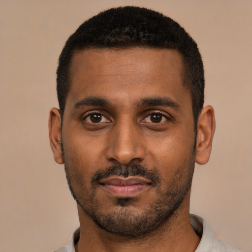 Neutral black young-adult male with short  black hair and brown eyes