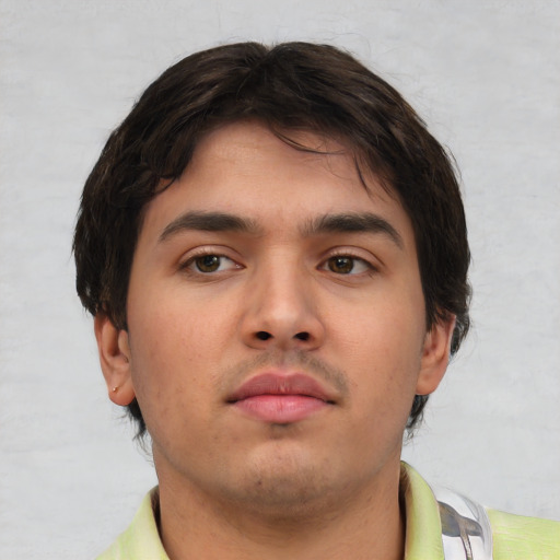 Neutral asian young-adult male with short  brown hair and brown eyes