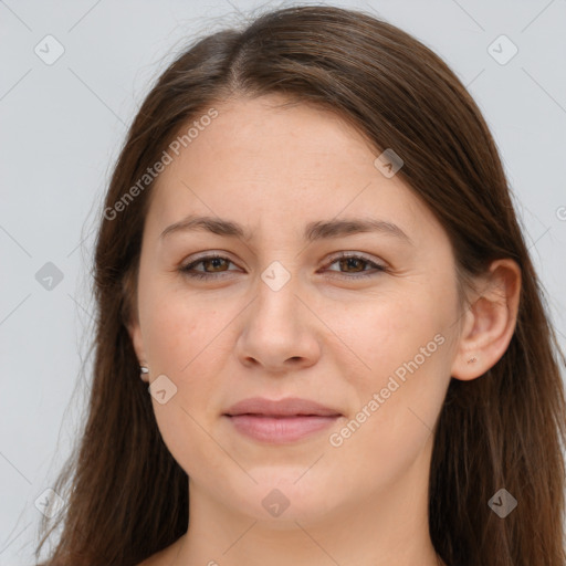 Joyful white young-adult female with long  brown hair and grey eyes