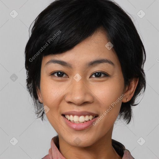 Joyful asian young-adult female with medium  black hair and brown eyes