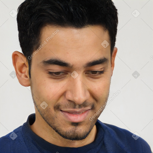 Joyful asian young-adult male with short  black hair and brown eyes