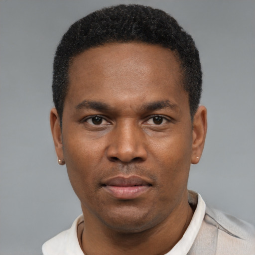 Neutral black young-adult male with short  black hair and brown eyes