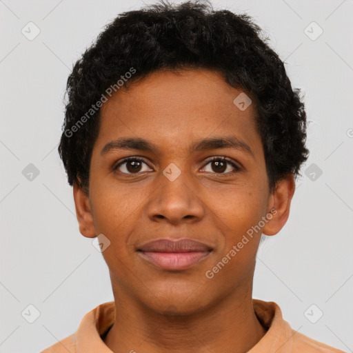 Joyful black young-adult male with short  brown hair and brown eyes