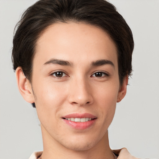 Joyful white young-adult female with short  brown hair and brown eyes