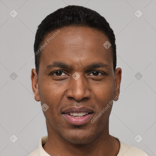 Joyful black young-adult male with short  black hair and brown eyes