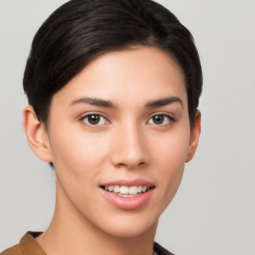 Joyful white young-adult female with short  brown hair and brown eyes