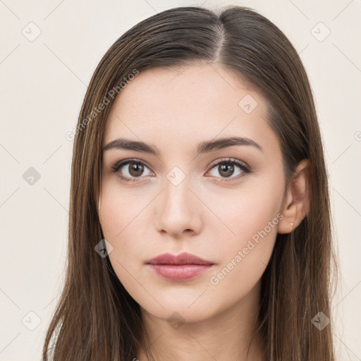 Neutral white young-adult female with long  brown hair and brown eyes