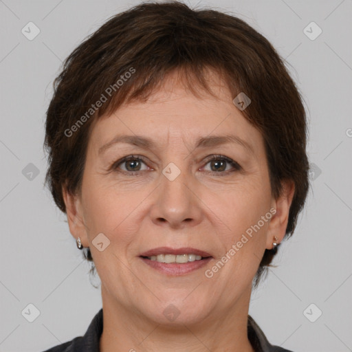 Joyful white adult female with medium  brown hair and brown eyes