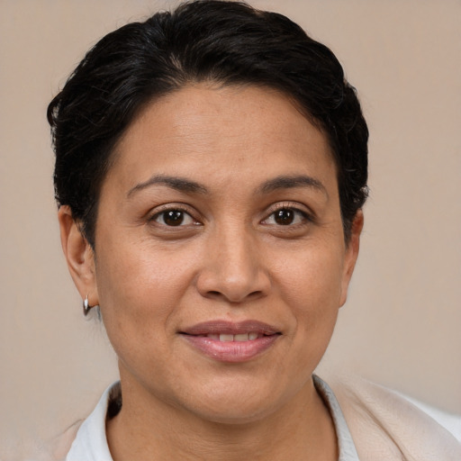 Joyful white adult female with short  brown hair and brown eyes