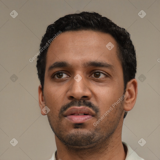 Neutral black young-adult male with short  black hair and brown eyes