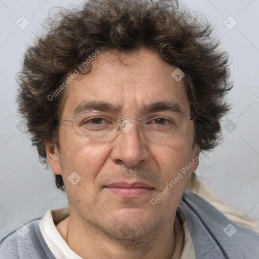 Joyful white middle-aged male with short  brown hair and brown eyes