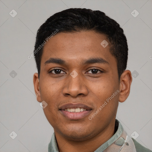 Joyful latino young-adult male with short  black hair and brown eyes