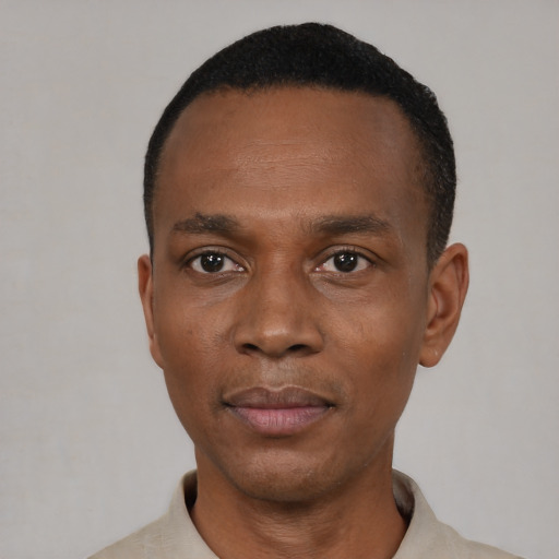 Neutral black young-adult male with short  black hair and brown eyes