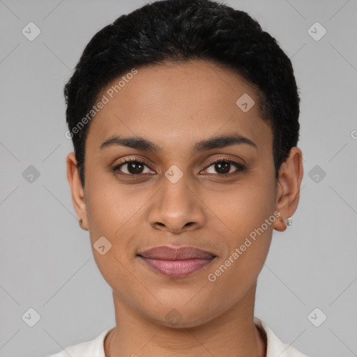 Joyful latino young-adult female with short  black hair and brown eyes