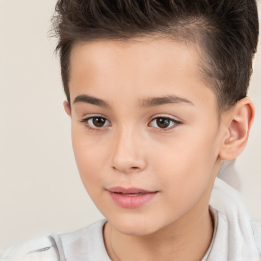 Joyful white child female with short  brown hair and brown eyes