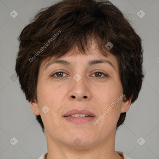 Joyful white adult female with short  brown hair and brown eyes