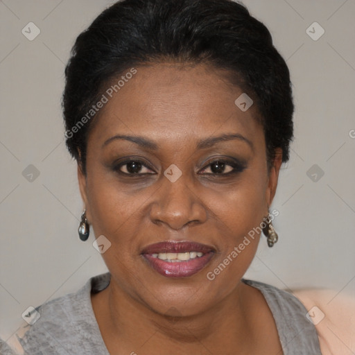 Joyful black adult female with short  brown hair and brown eyes