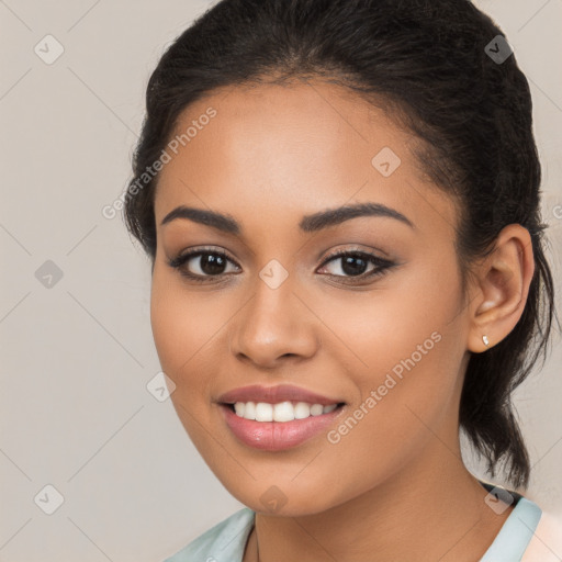 Joyful latino young-adult female with long  brown hair and brown eyes