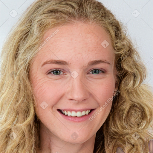 Joyful white young-adult female with long  brown hair and green eyes