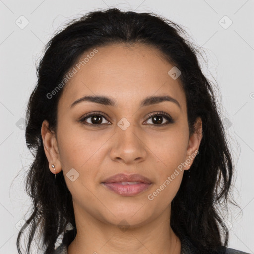 Joyful latino young-adult female with long  brown hair and brown eyes