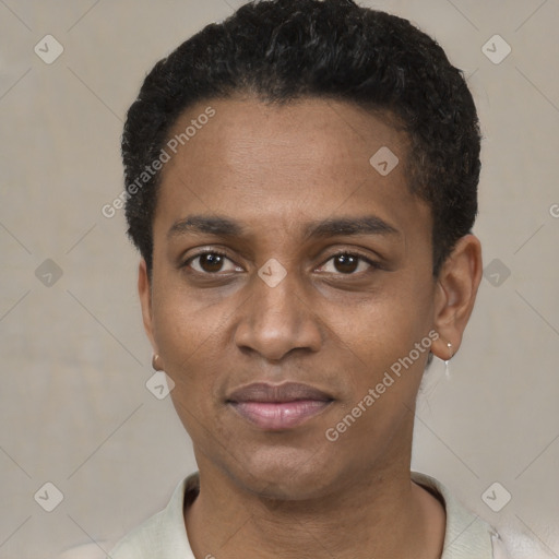 Joyful black young-adult male with short  black hair and brown eyes