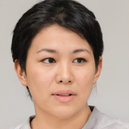 Neutral asian young-adult female with short  black hair and brown eyes