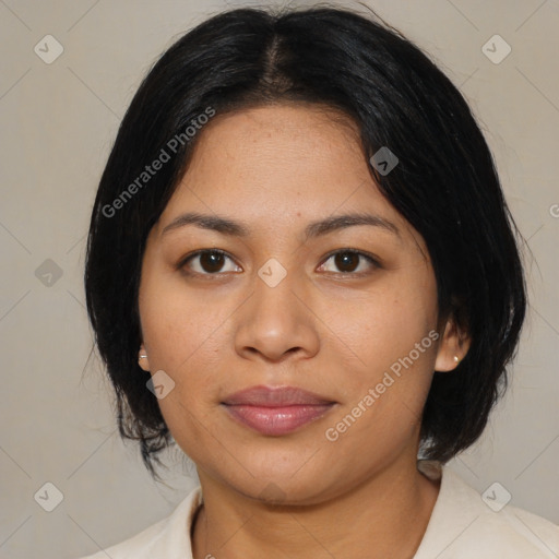 Joyful latino young-adult female with medium  black hair and brown eyes