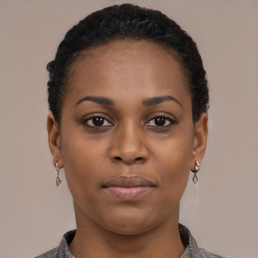 Neutral black young-adult female with short  black hair and brown eyes