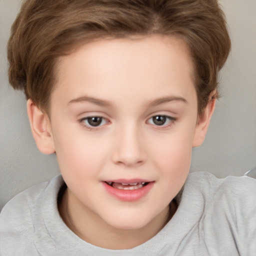 Joyful white child female with short  brown hair and brown eyes