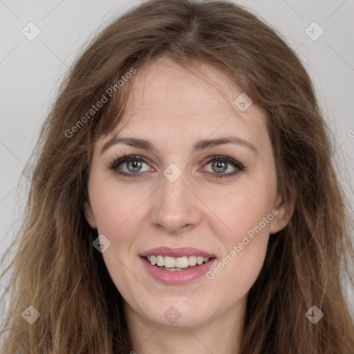 Joyful white young-adult female with long  brown hair and green eyes