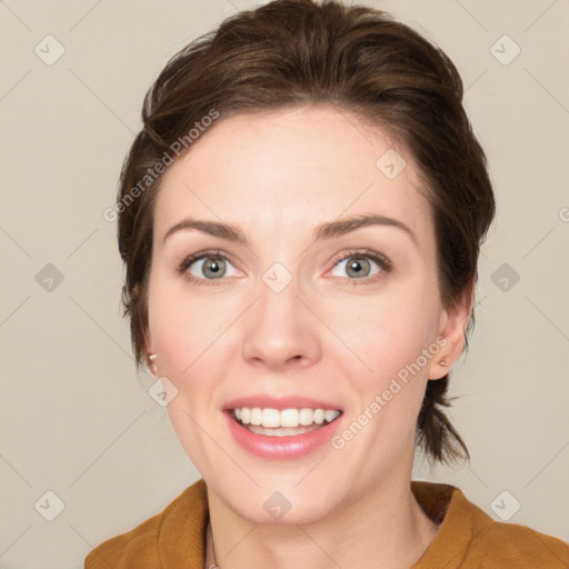 Joyful white young-adult female with medium  brown hair and green eyes