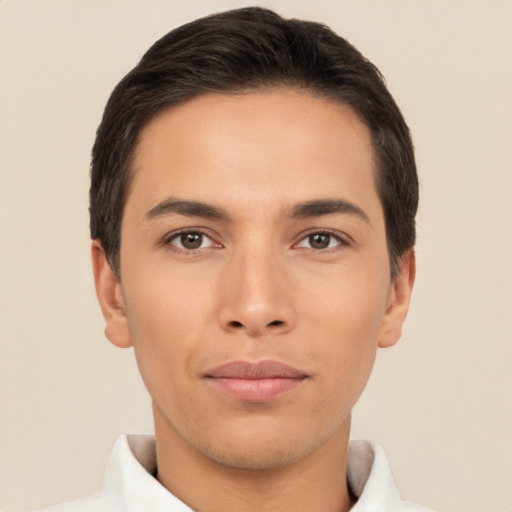 Joyful asian young-adult male with short  brown hair and brown eyes