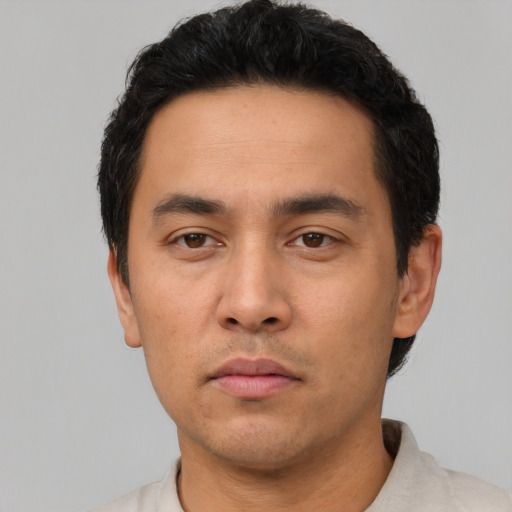 Neutral asian young-adult male with short  black hair and brown eyes