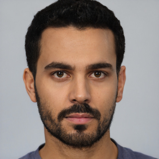 Neutral latino young-adult male with short  black hair and brown eyes