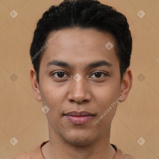 Joyful latino young-adult male with short  black hair and brown eyes