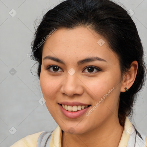 Joyful asian young-adult female with medium  brown hair and brown eyes