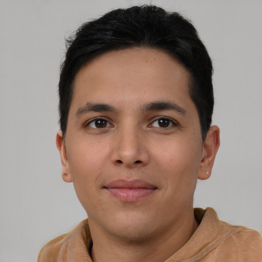 Joyful asian young-adult male with short  brown hair and brown eyes