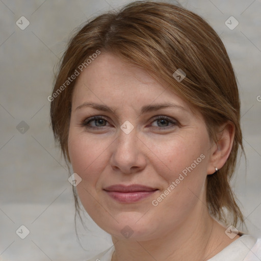 Joyful white young-adult female with medium  brown hair and blue eyes